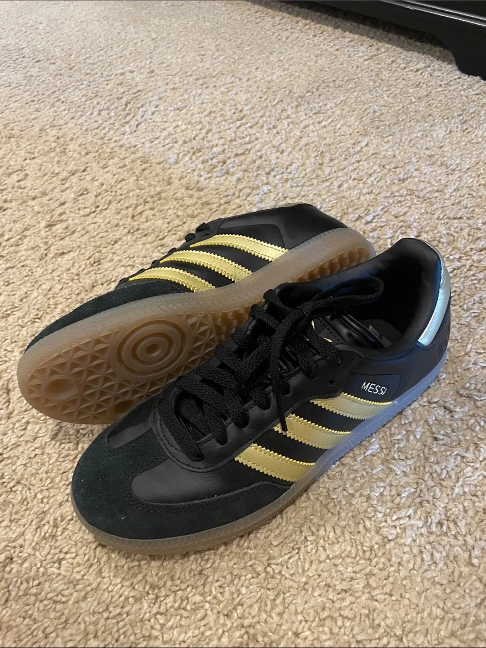 adidas boys Black and Gold Messi sneakers size 4 1/2.